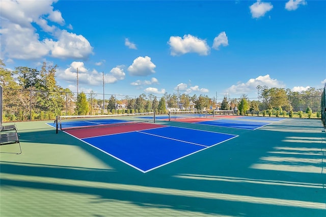 view of tennis court featuring basketball court