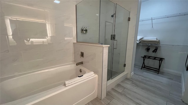 bathroom with independent shower and bath