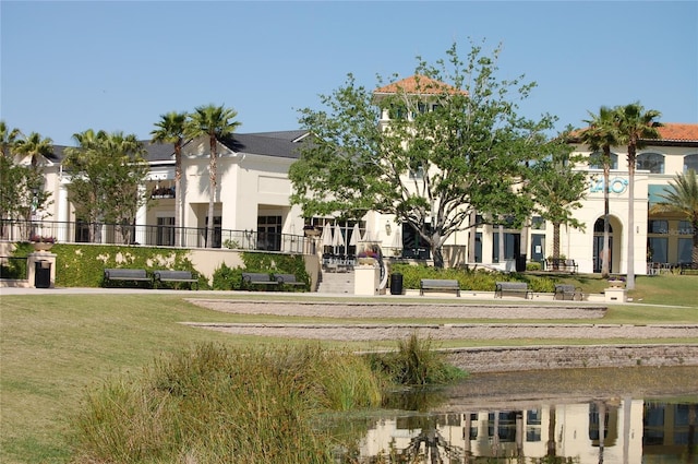 surrounding community featuring a lawn