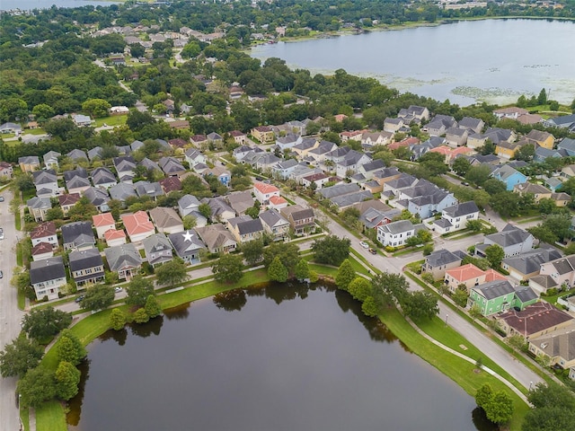 birds eye view of property featuring a residential view and a water view