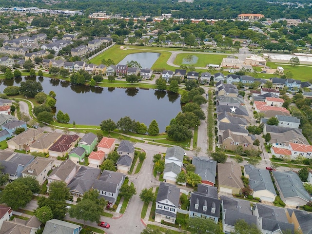 aerial view with a residential view and a water view