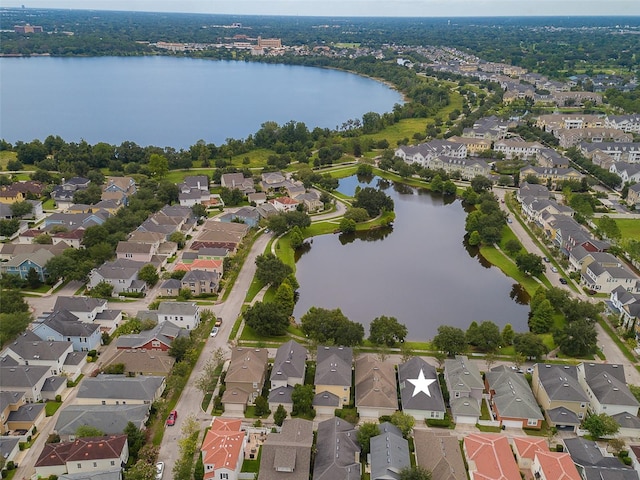 aerial view featuring a water view and a residential view
