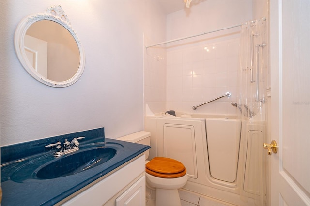 full bathroom with tile patterned floors, toilet, shower / tub combination, and vanity