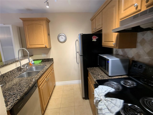 kitchen with range with electric cooktop, sink, light tile patterned floors, dark stone countertops, and dishwasher