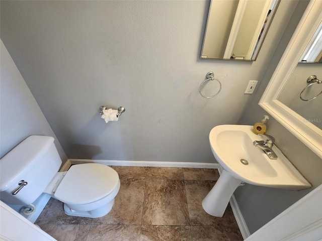 bathroom featuring toilet