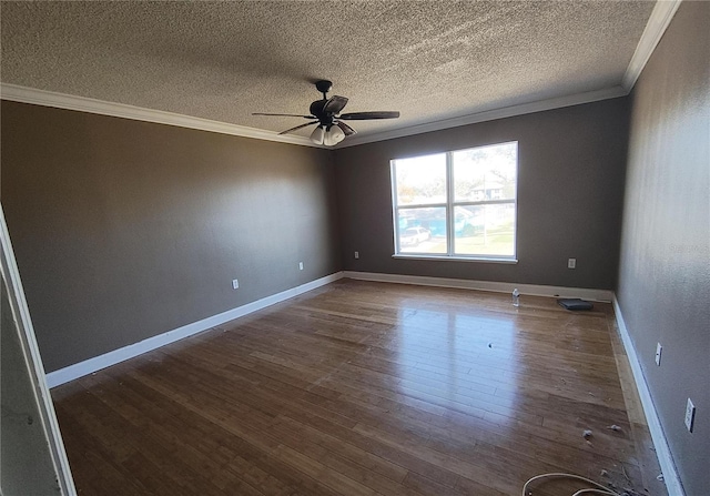 spare room with dark wood-type flooring, ceiling fan, crown molding, and a textured ceiling