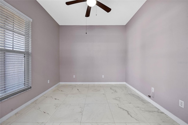 spare room featuring ceiling fan