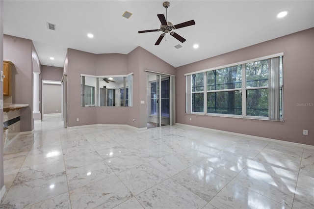 unfurnished living room with ceiling fan