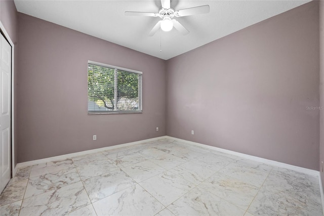 unfurnished room featuring ceiling fan