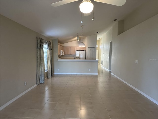 unfurnished living room with light tile patterned floors, vaulted ceiling, and ceiling fan