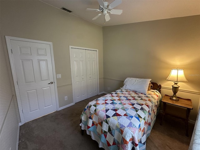 bedroom with ceiling fan and dark carpet