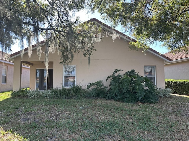 exterior space with a yard