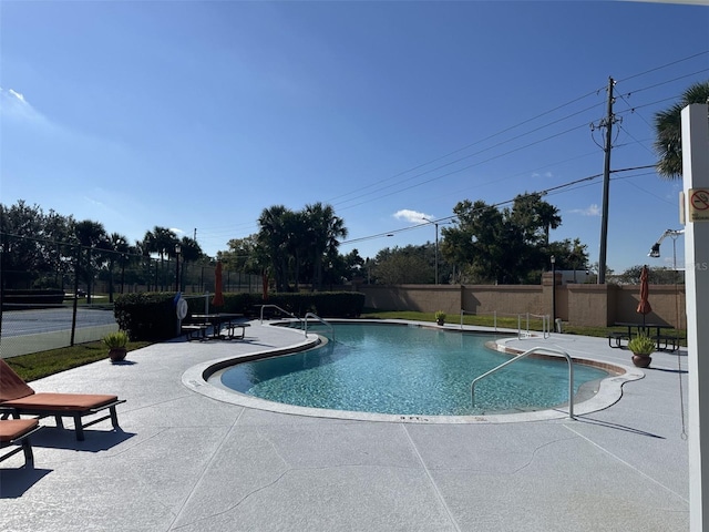 view of pool with a patio area