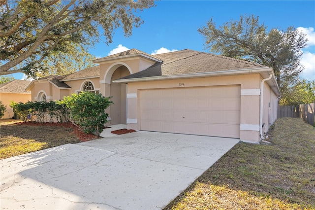 view of front of home featuring a garage