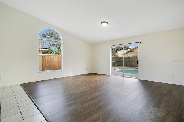 empty room featuring hardwood / wood-style flooring