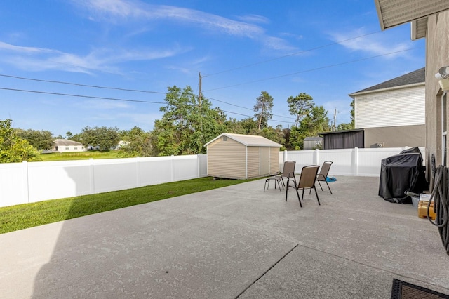 view of patio / terrace featuring a storage shed