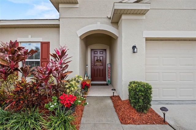 property entrance with a garage