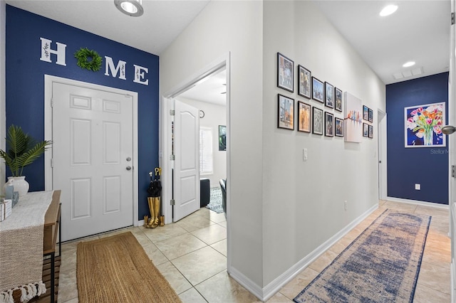 foyer entrance featuring light tile patterned floors