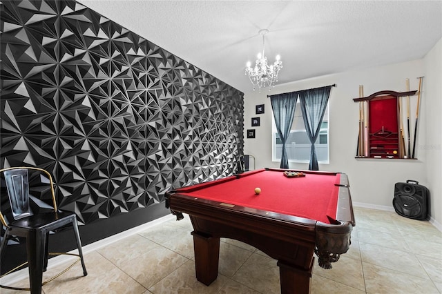 playroom featuring light tile patterned floors, a textured ceiling, a notable chandelier, and pool table