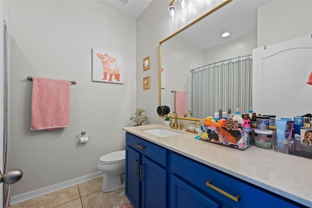 bathroom with curtained shower, tile patterned flooring, vanity, and toilet