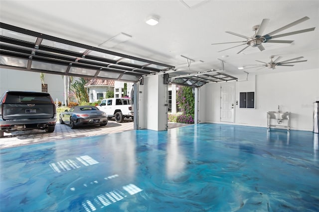 garage with electric panel and sink