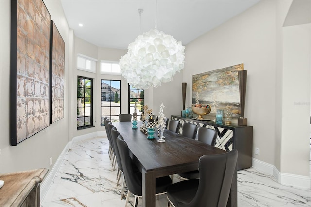 dining room with a chandelier