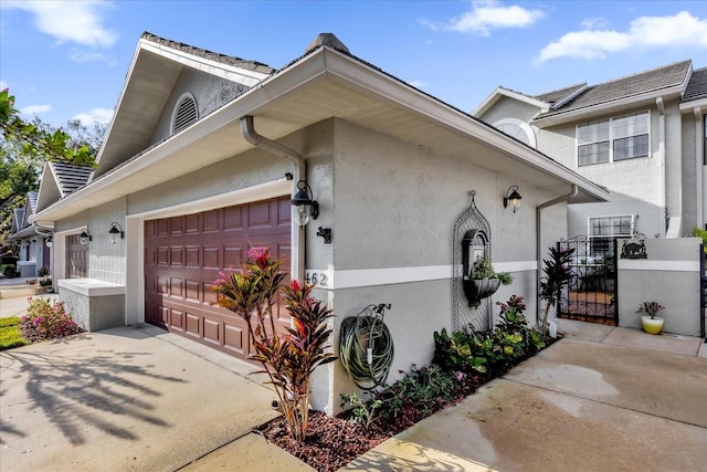 view of property exterior featuring a garage