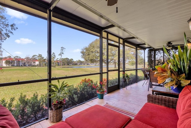 sunroom / solarium with ceiling fan