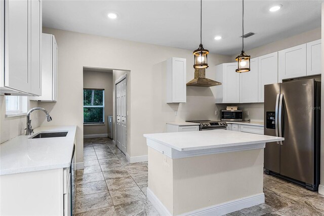 kitchen featuring a center island, sink, white cabinets, and stainless steel appliances