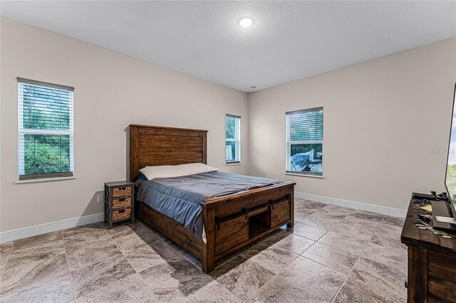 bedroom with a textured ceiling