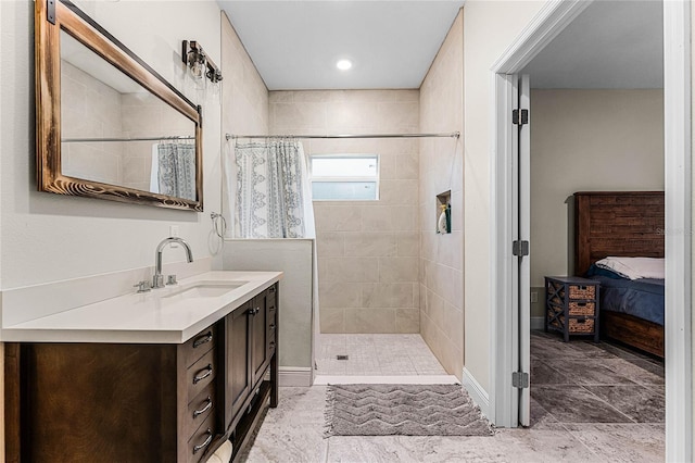 bathroom featuring vanity and walk in shower