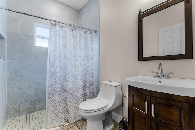 bathroom with a shower with curtain, vanity, toilet, and tile patterned flooring