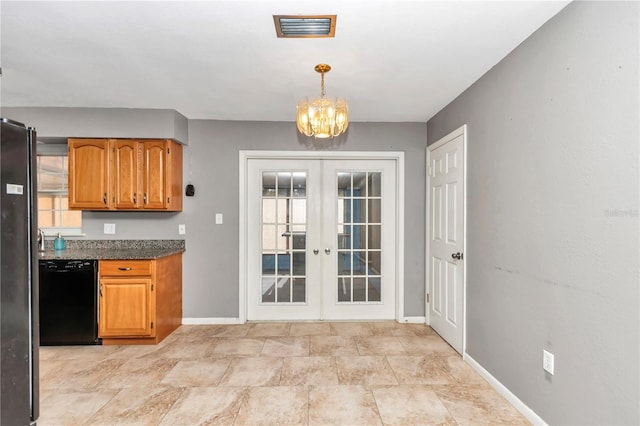 kitchen featuring french doors, pendant lighting, a notable chandelier, and black dishwasher