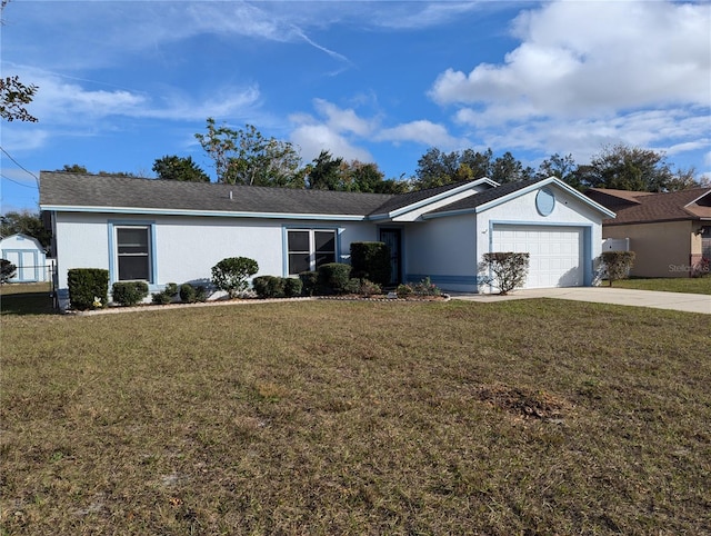 single story home featuring a garage and a front lawn