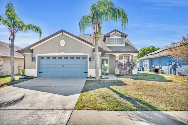 view of front of house featuring a garage, central air condition unit, and a front yard