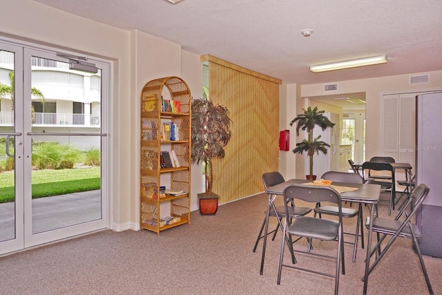 view of carpeted dining room