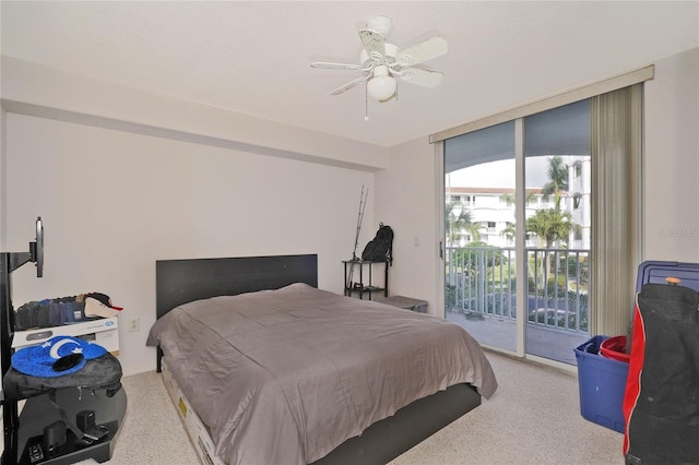 bedroom featuring ceiling fan, access to exterior, and carpet floors