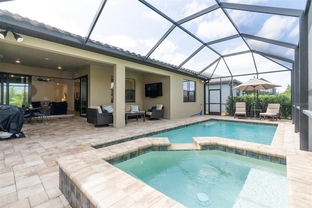 view of swimming pool with a patio area, an outdoor living space, ceiling fan, and glass enclosure