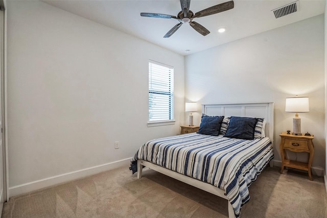 carpeted bedroom featuring ceiling fan