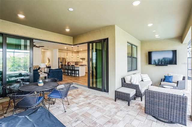 view of patio / terrace with an outdoor living space