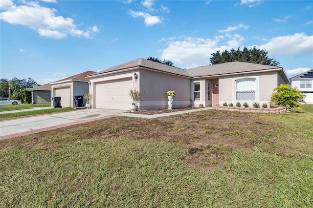 ranch-style house featuring a garage and a front lawn