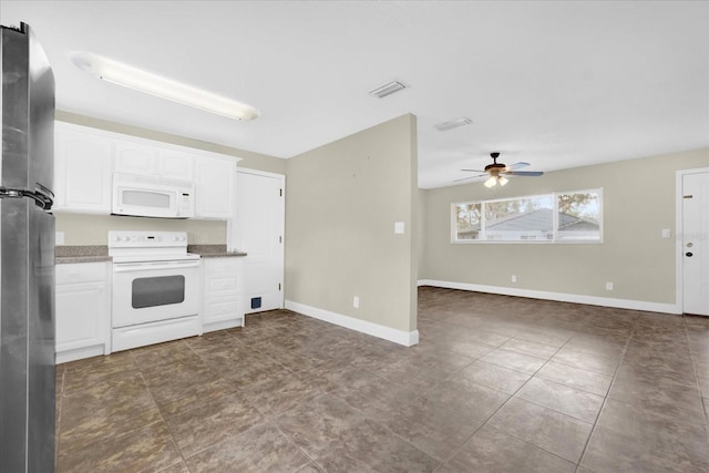 kitchen with white appliances, white cabinetry, and ceiling fan