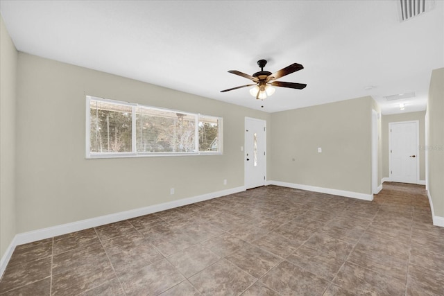 spare room with ceiling fan