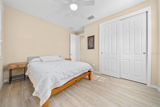 bedroom featuring a closet and ceiling fan