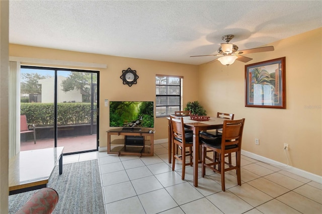 2007 Disney Mgm Studio Ct, Kissimmee, FL 34746 - dining room with light tile patterned floors, a ceiling fan, and a textured ceiling