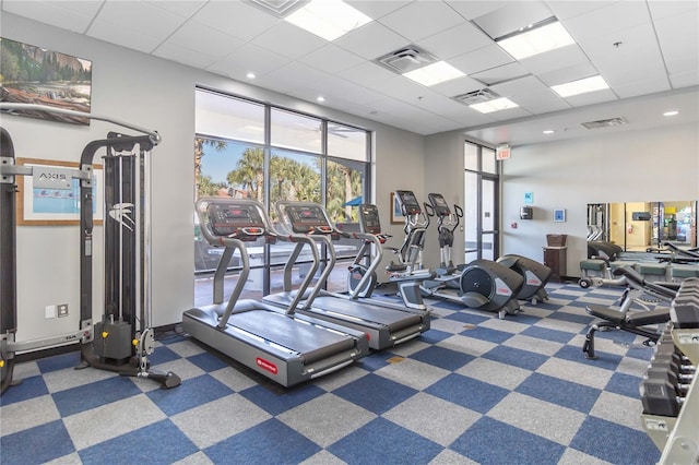 gym with a drop ceiling