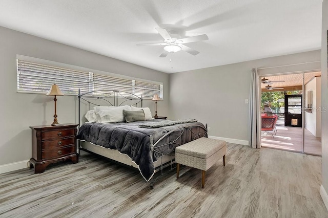 bedroom featuring light wood-style floors, access to outside, baseboards, and ceiling fan