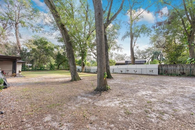 view of yard with fence