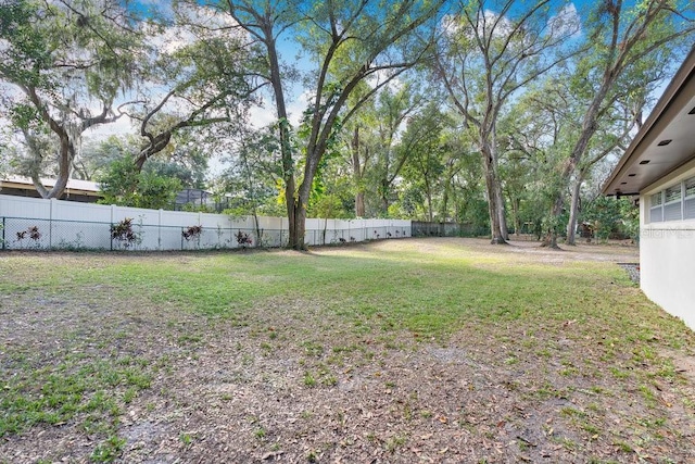 view of yard with fence