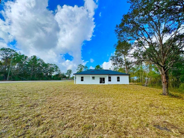 exterior space with a lawn